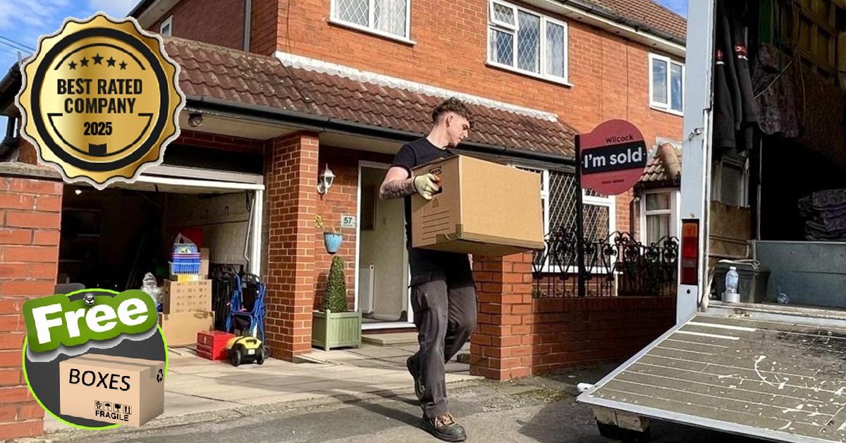 A Removals Huddersfield crew member carrying boxes from a sold home on moving day